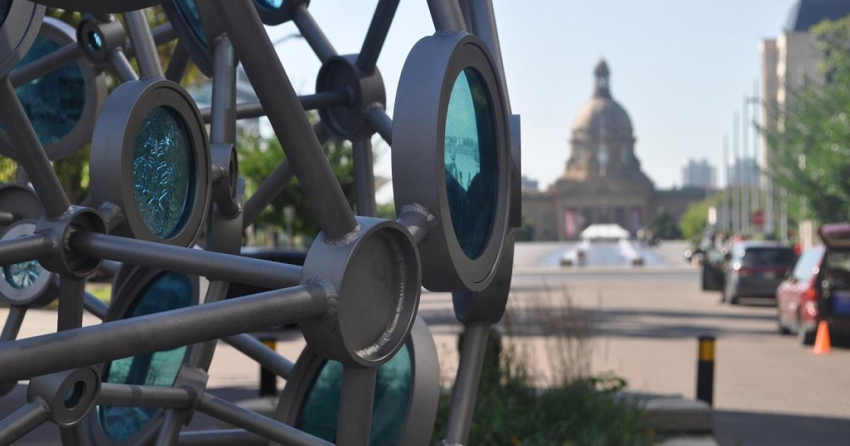 Section of sculpture: Transect by Firebrand Glass (Julia Reimer and Tyler Rock), 2017, stainless steel, laminated glass, cast glass, archival photos, Collection of the Alberta Foundation for the Arts