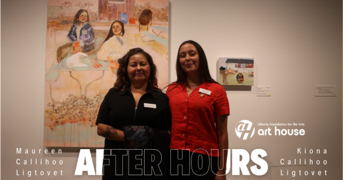 Maureen Callihoo and Kiona Callihoo Ligtvoet stand together in front of their artworks. Maureen is wearing a black shirt while Kiona is wearing a red shirt.